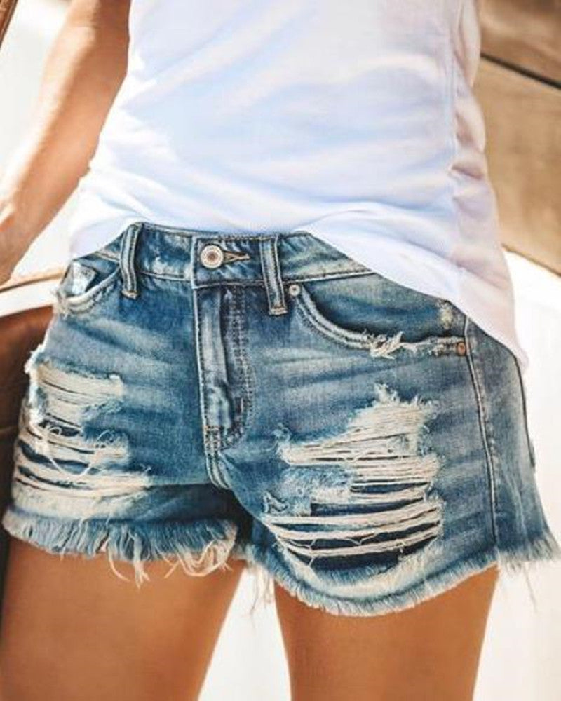 Women's ripped fringed denim shorts